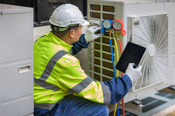 Professional Hvac technician working in Harrington, DE